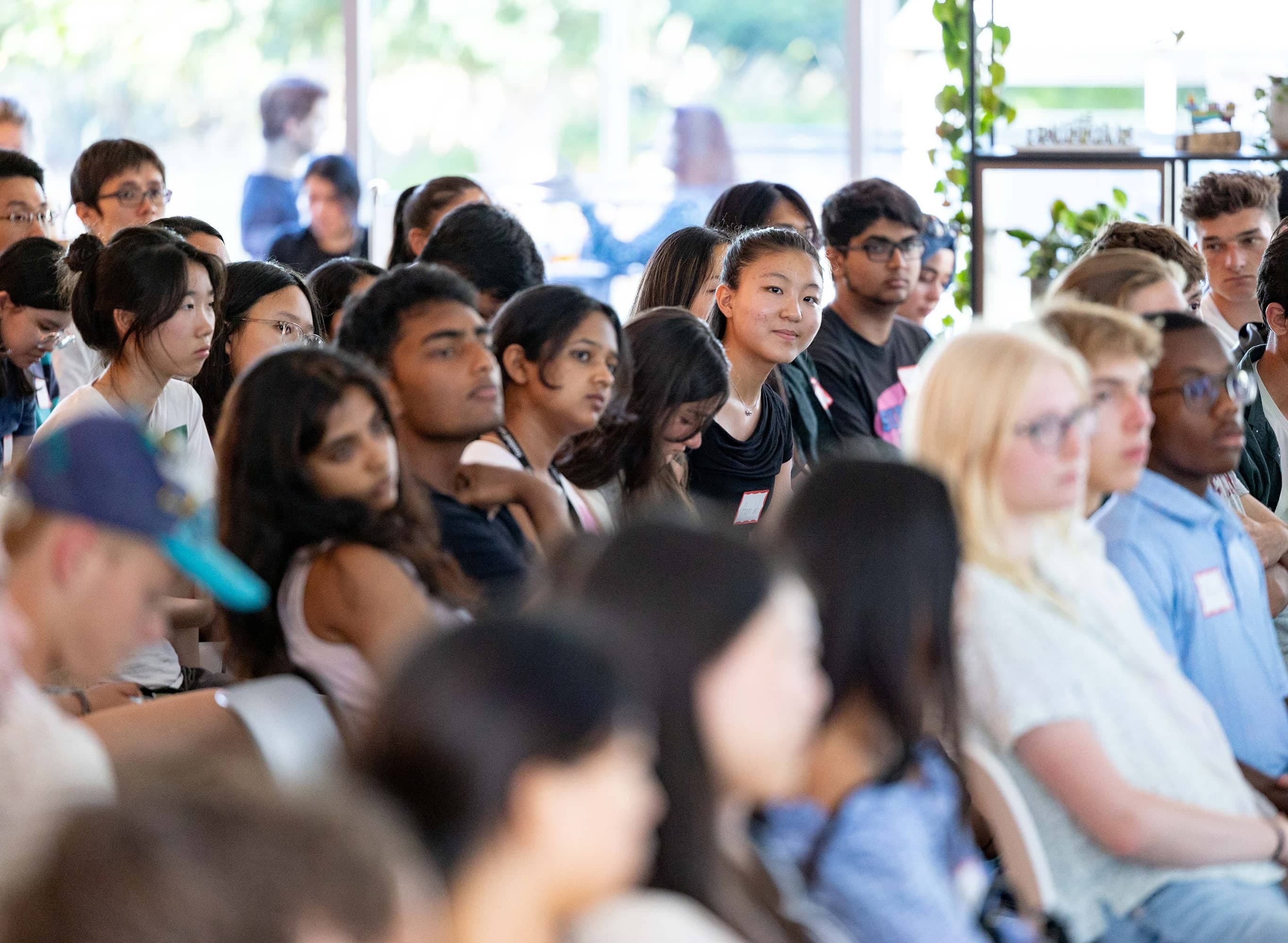 Students listen to speakers at Stanford Research Park. (Photo credits to Nikolas Liepins/Ethography for Stanford Summer Session)